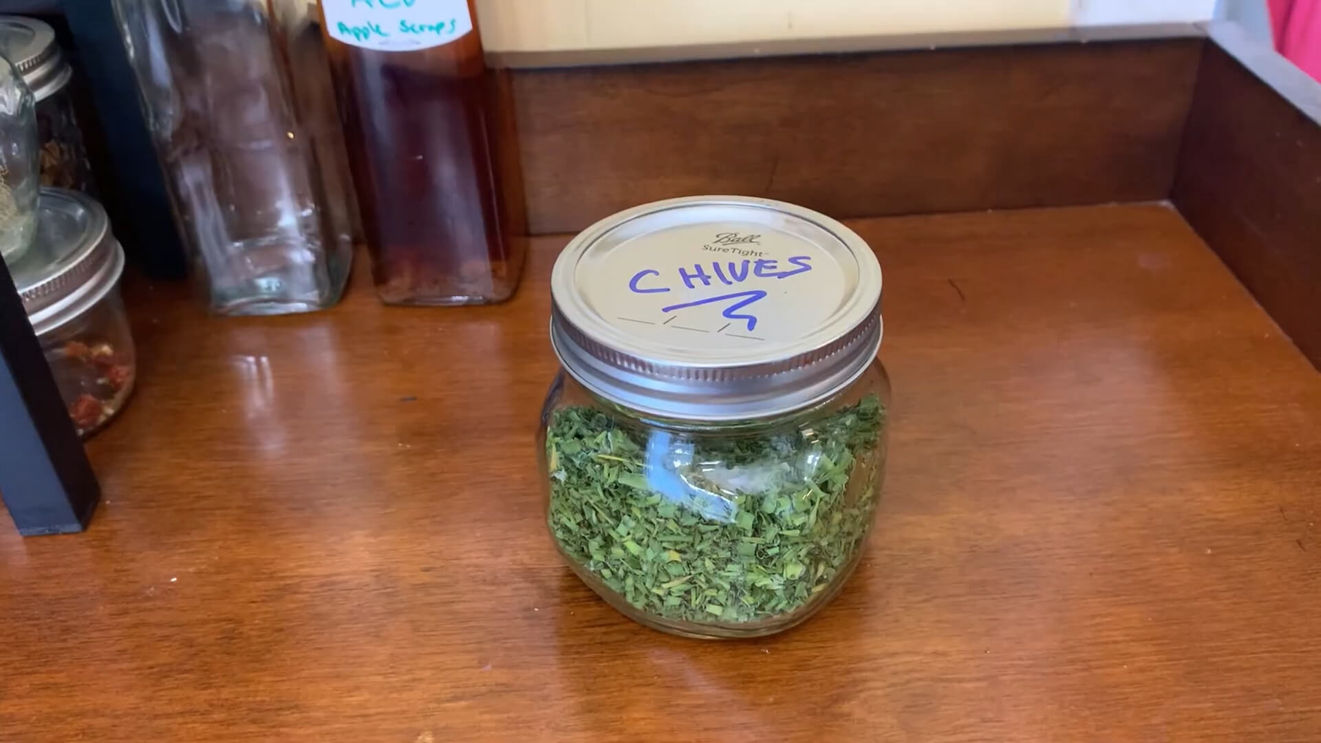 Labeled Container with Chives for Freezing